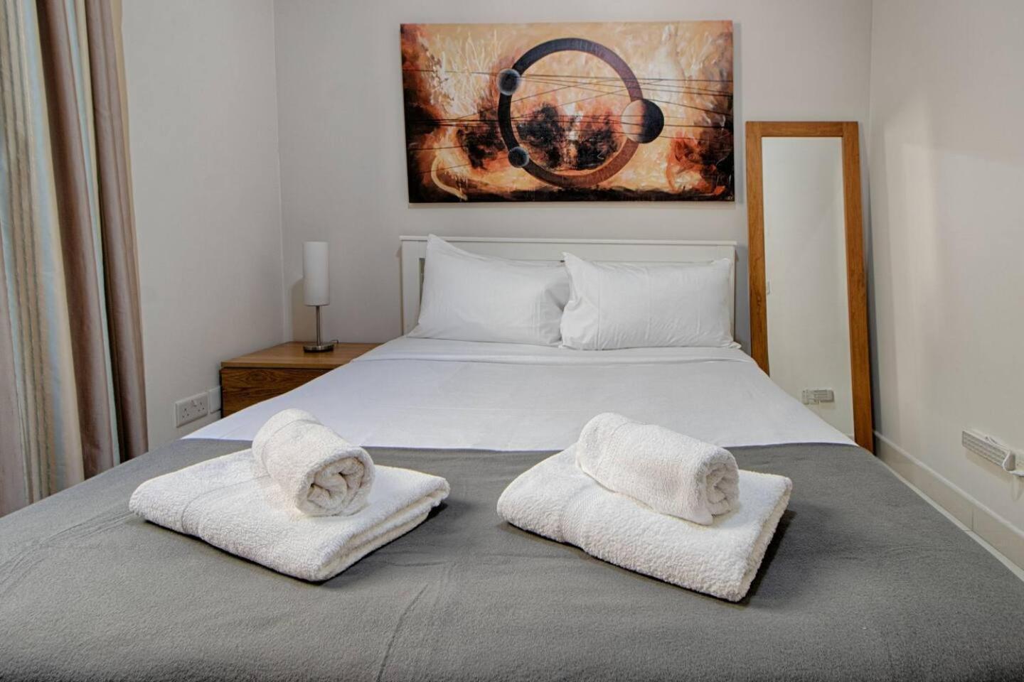 The By Homely Apartment